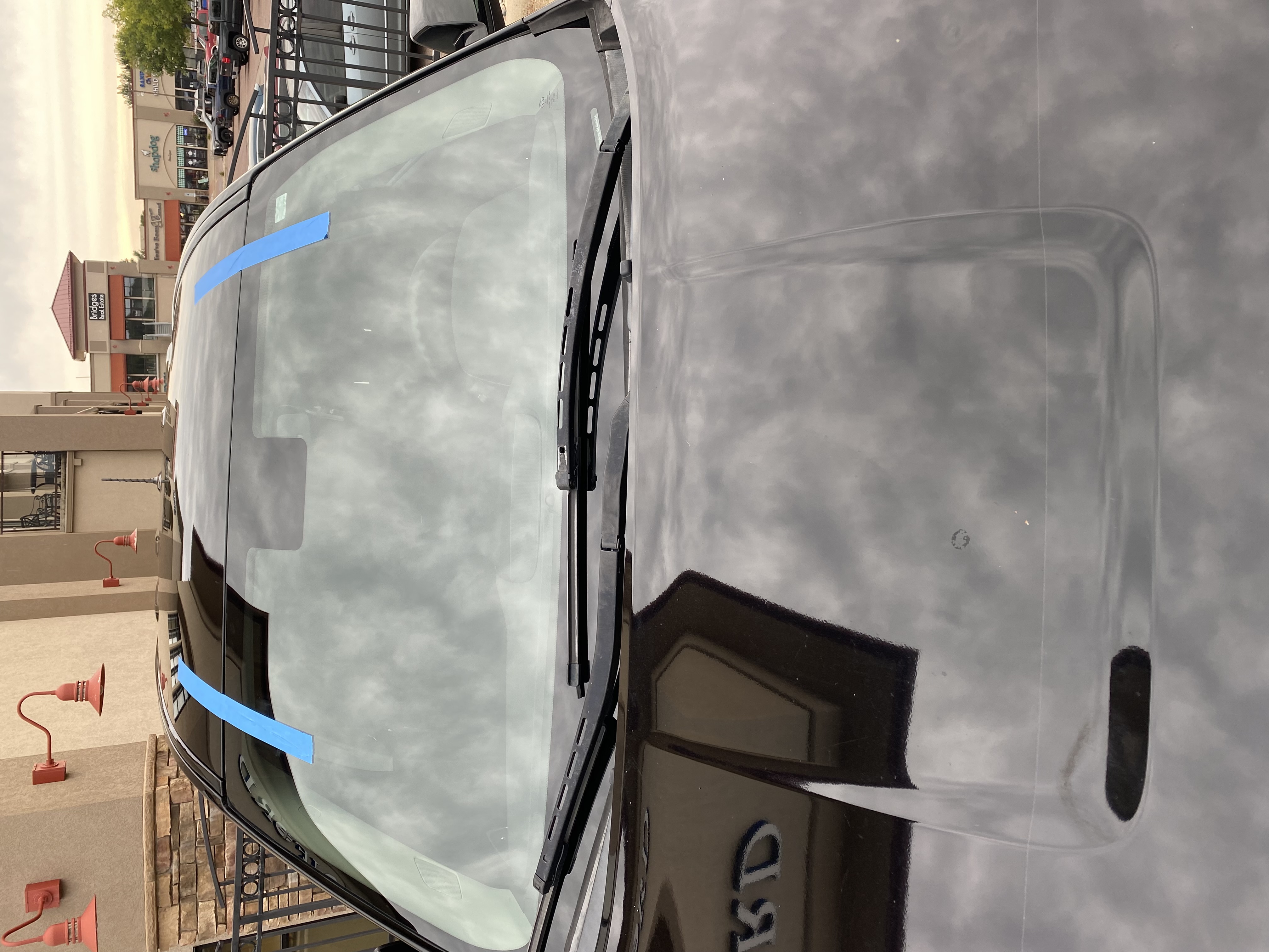 Windshield replacement on black vehicle by Chip Doctor of Sioux Falls