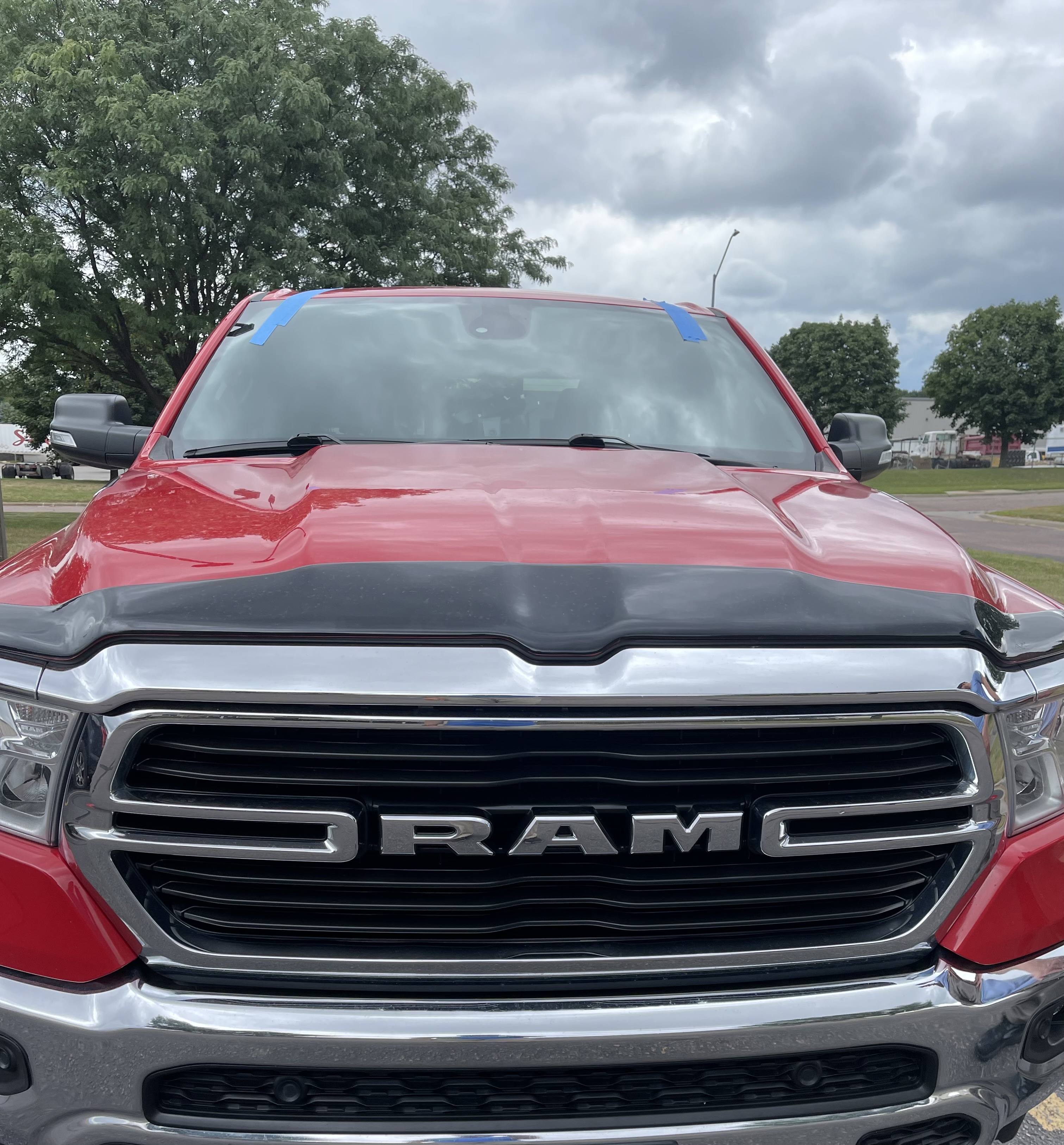 Windshield replacement on red Ram truck by Chip Doctor of Sioux Falls